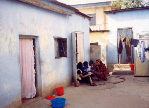 Leslie sharing with girls in brothel